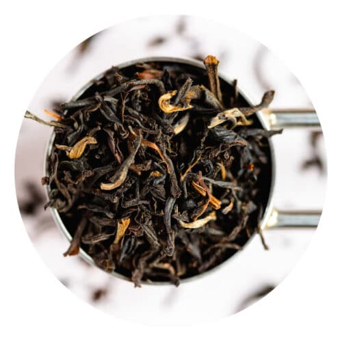 Leafy Bean Co blend called Brew-tea-full morning , loose leaf tea in a metal tea scoop.